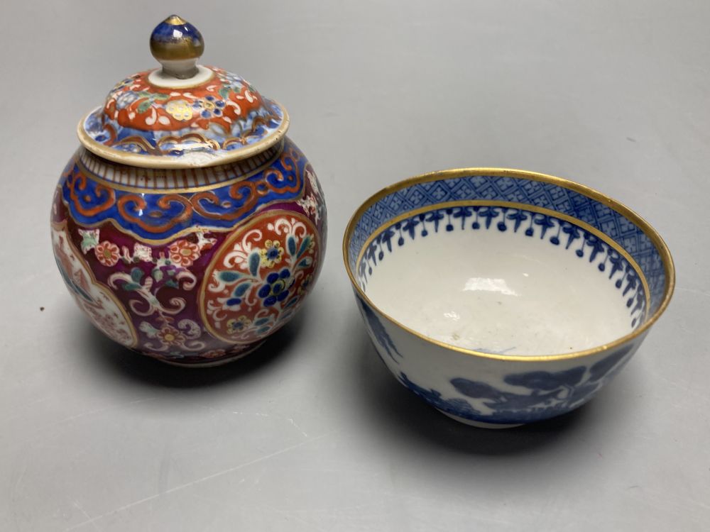 A Chinese jar and cover and a tea bowl, jar and cover height 10cm
